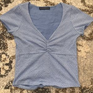 Brandy Melville blue and white floral V neck top